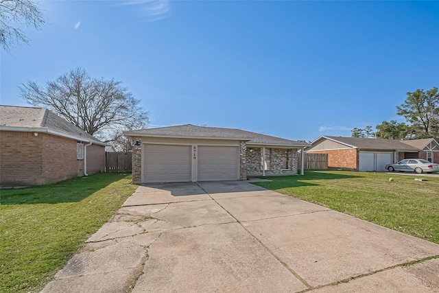 8719 Valley Meadow Dr, Houston, TX 77078 - view of front of home with driveway, a front yard, brick siding, a garage, and fence