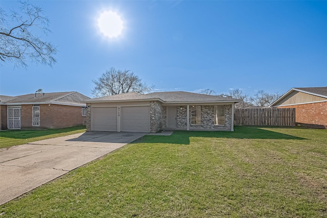 8719 Valley Meadow Dr, Houston, TX 77078 - single story home with a front yard, fence, brick siding, a garage, and concrete driveway