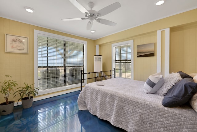 bedroom with crown molding and a ceiling fan
