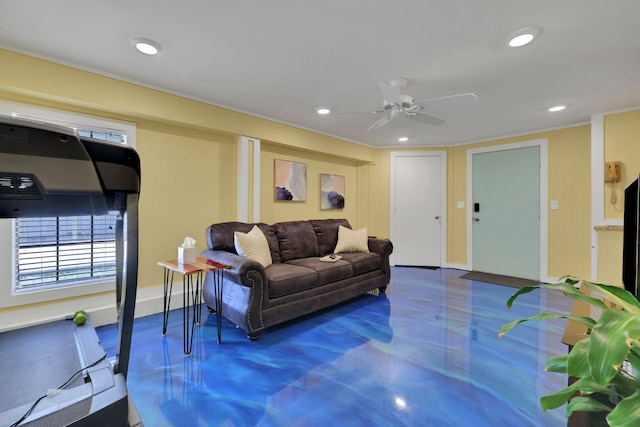 living area featuring recessed lighting and a ceiling fan