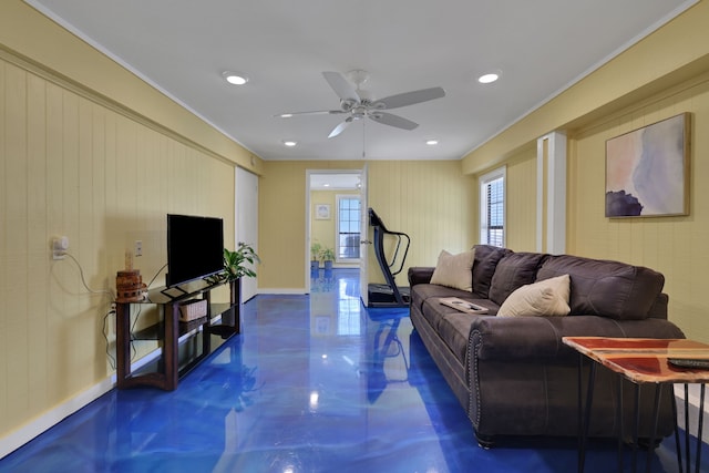 living area with recessed lighting, a ceiling fan, and ornamental molding