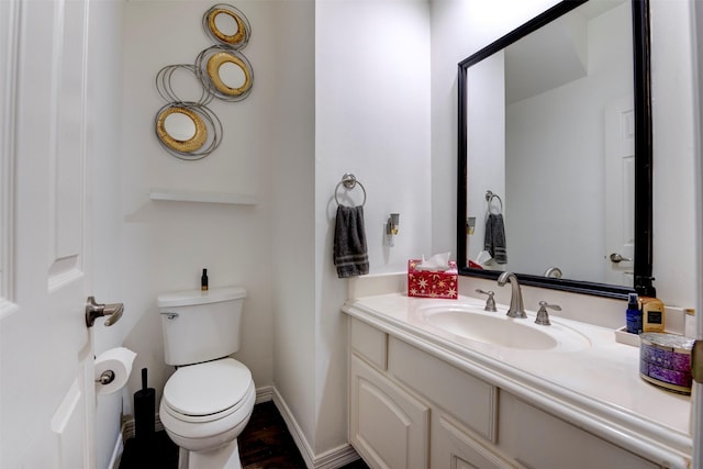 15122 Windsdowne Ln, Cypress, TX 77429 - half bathroom featuring vanity and wood finished floors