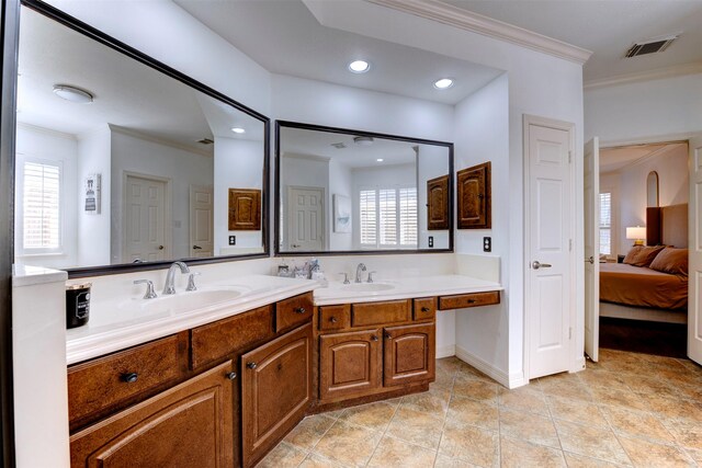 15122 Windsdowne Ln, Cypress, TX 77429 - full bath featuring crown molding, double vanity, ensuite bathroom, recessed lighting, and tile patterned floors