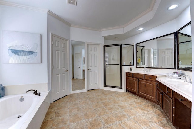15122 Windsdowne Ln, Cypress, TX 77429 - bathroom featuring crown molding, double vanity, a stall shower, a bath, and recessed lighting