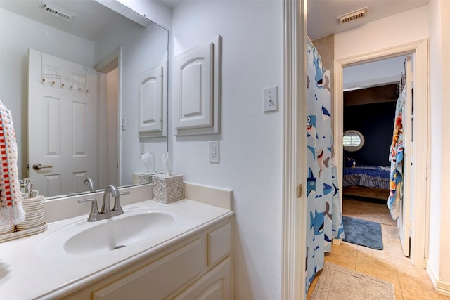 15122 Windsdowne Ln, Cypress, TX 77429 - bathroom featuring vanity and tile patterned flooring