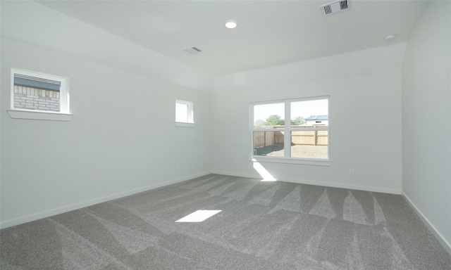 empty room featuring recessed lighting, visible vents, baseboards, and carpet floors