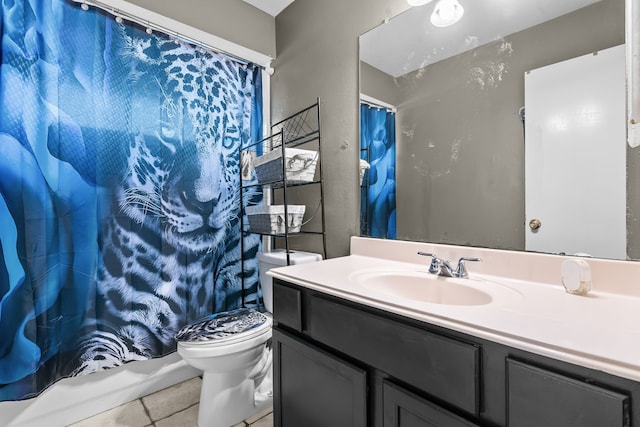 full bathroom with tile patterned floors, a shower with curtain, vanity, and toilet