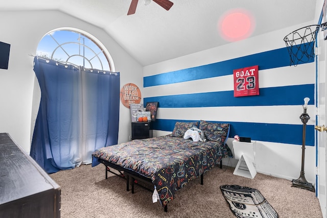 bedroom featuring lofted ceiling, a ceiling fan, and carpet floors