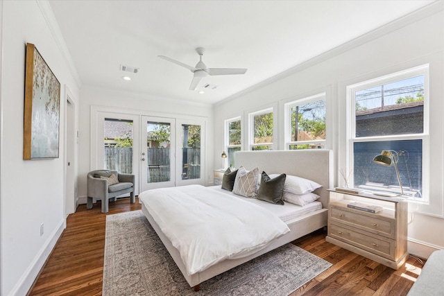 636 Pizer St, Houston, TX 77009 - bedroom with french doors, crown molding, access to outside, dark wood-type flooring, and baseboards