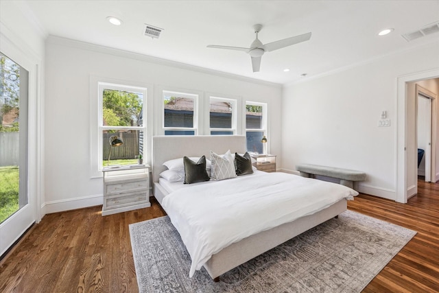 636 Pizer St, Houston, TX 77009 - bedroom with ornamental molding, multiple windows, wood finished floors, baseboards, and recessed lighting