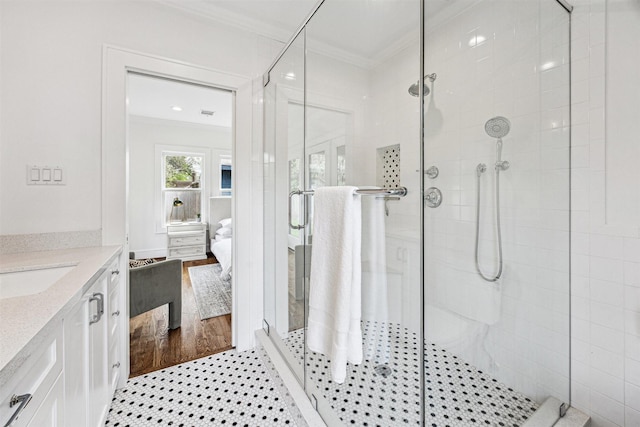 636 Pizer St, Houston, TX 77009 - bathroom featuring ornamental molding, a shower stall, vanity, and tile patterned floors