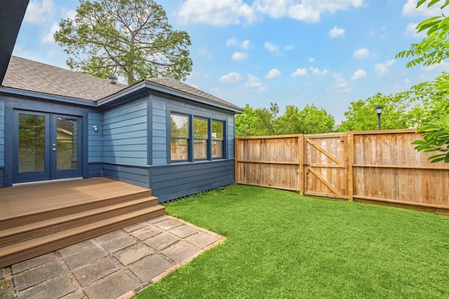 636 Pizer St, Houston, TX 77009 - view of yard with french doors, a deck, and a gate
