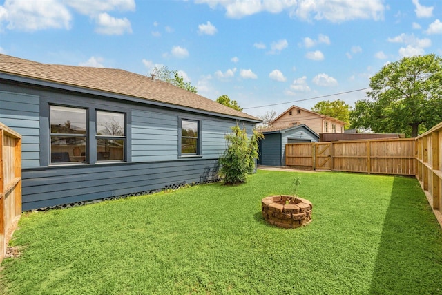 636 Pizer St, Houston, TX 77009 - view of yard featuring an outdoor fire pit