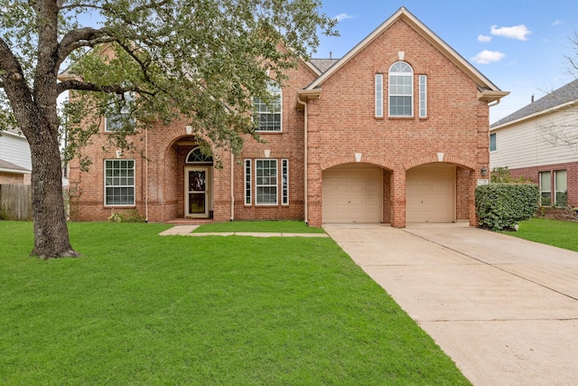 view of front of home featuring a front yard, an attached garage, brick siding, and concrete driveway