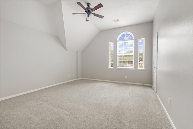 bonus room featuring baseboards, vaulted ceiling, a ceiling fan, carpet floors, and visible vents