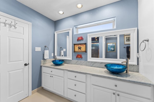 full bathroom with double vanity