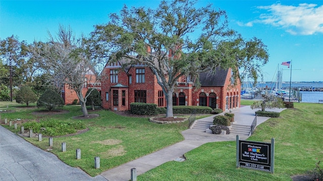 2729 Lighthouse Dr, Houston, TX 77058 - view of home's community featuring a lawn