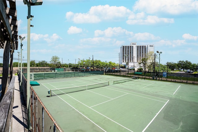 2729 Lighthouse Dr, Houston, TX 77058 - view of tennis court with community basketball court and fence