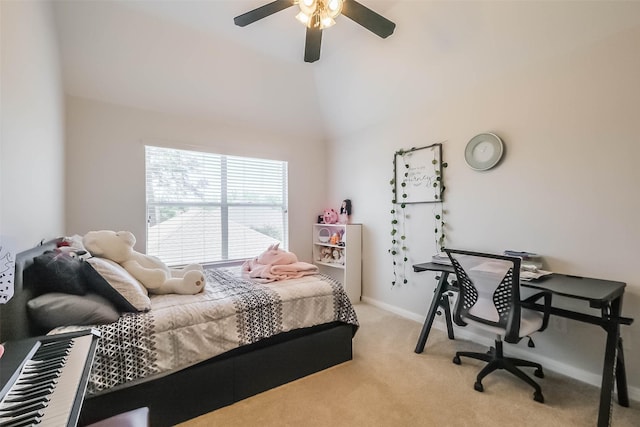 7015 Timber Edge Ln, Humble, TX 77346 - bedroom with light colored carpet, vaulted ceiling, baseboards, and a ceiling fan