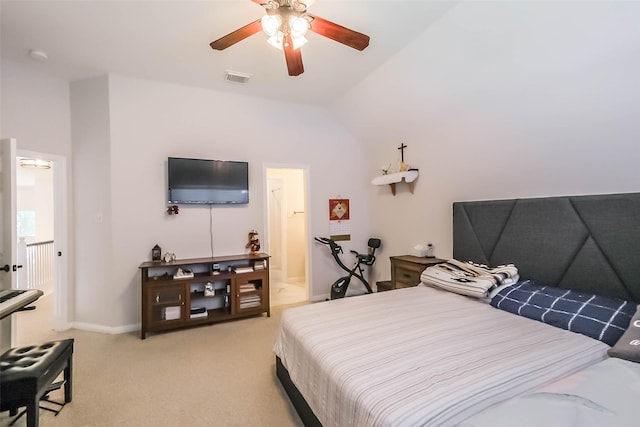 7015 Timber Edge Ln, Humble, TX 77346 - bedroom with lofted ceiling, light colored carpet, baseboards, and ceiling fan