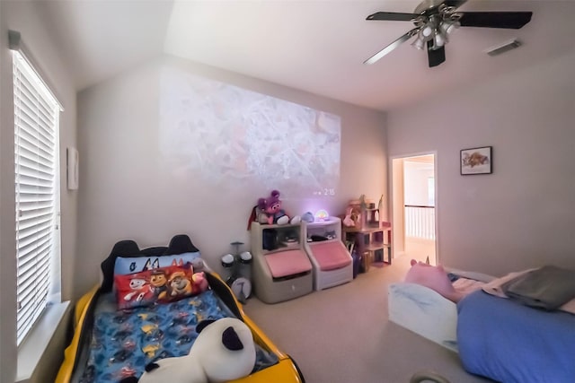 7015 Timber Edge Ln, Humble, TX 77346 - bedroom with lofted ceiling, carpet flooring, and ceiling fan