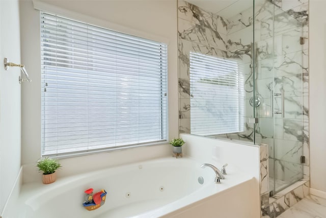 7015 Timber Edge Ln, Humble, TX 77346 - full bathroom featuring a whirlpool tub, a marble finish shower, marble look tiles, and healthy amount of natural light