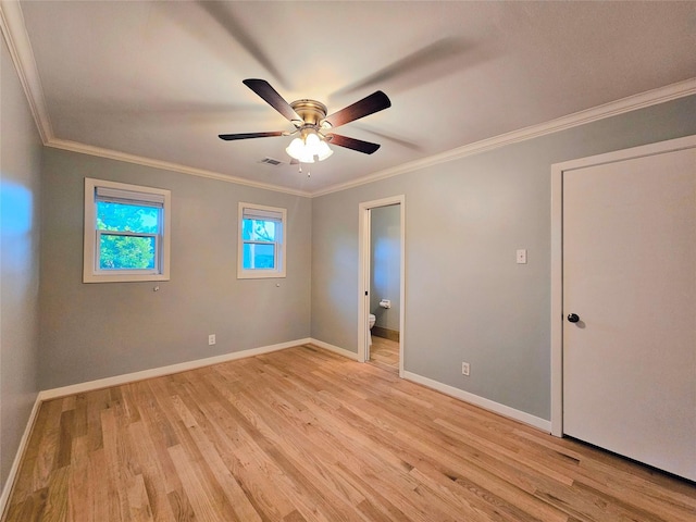 2527 Willowby Dr, Houston, TX 77008 - spare room with crown molding, light wood-style floors, and a ceiling fan