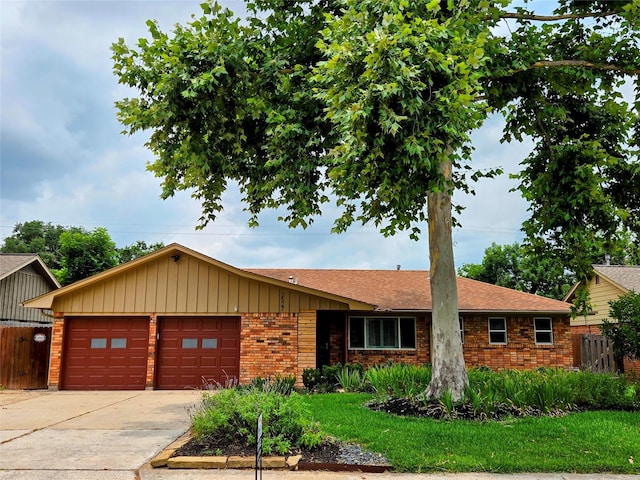 2527 Willowby Dr, Houston, TX 77008 - single story home featuring an attached garage, brick siding, driveway, roof with shingles, and board and batten siding