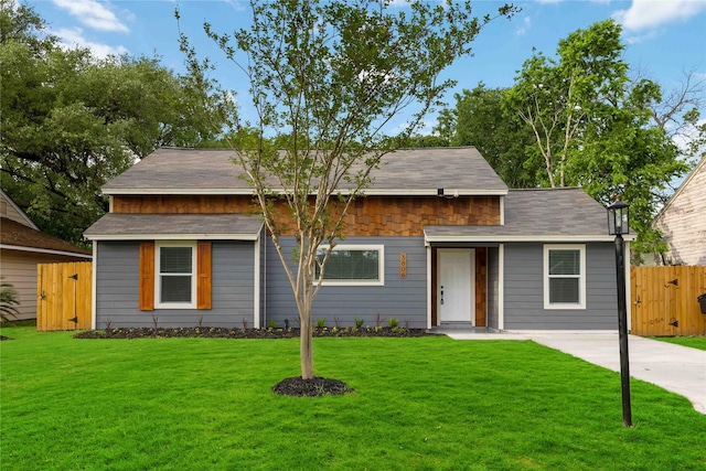 3806 Zephyr St, Houston, TX 77021 - view of front facade with a front yard, fence, and a gate