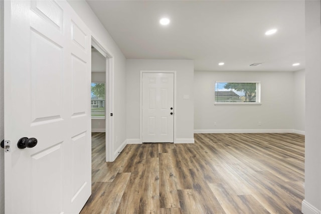3806 Zephyr St, Houston, TX 77021 - entryway with recessed lighting, baseboards, and wood finished floors