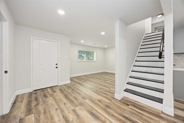 3806 Zephyr St, Houston, TX 77021 - foyer entrance with recessed lighting, stairway, wood finished floors, and baseboards