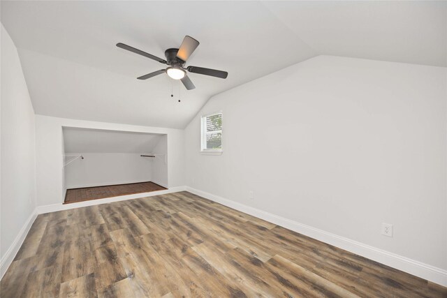 3806 Zephyr St, Houston, TX 77021 - additional living space featuring baseboards, vaulted ceiling, ceiling fan, and wood finished floors