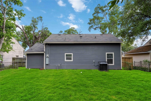 3806 Zephyr St, Houston, TX 77021 - rear view of property with a yard, fence, and central AC unit