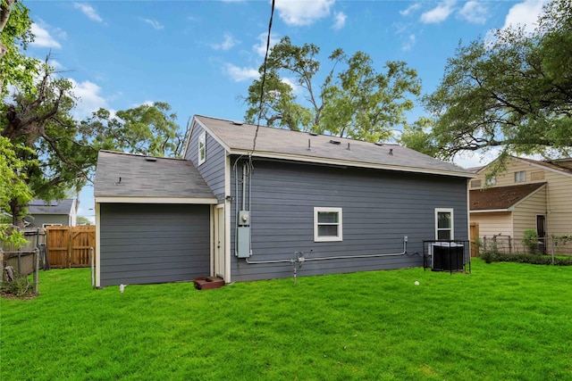 3806 Zephyr St, Houston, TX 77021 - rear view of property featuring a yard, fence, and central AC