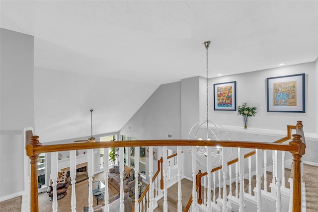 hall featuring carpet floors, recessed lighting, baseboards, and vaulted ceiling