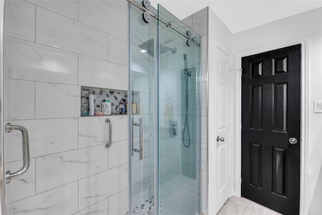 bathroom with a shower stall
