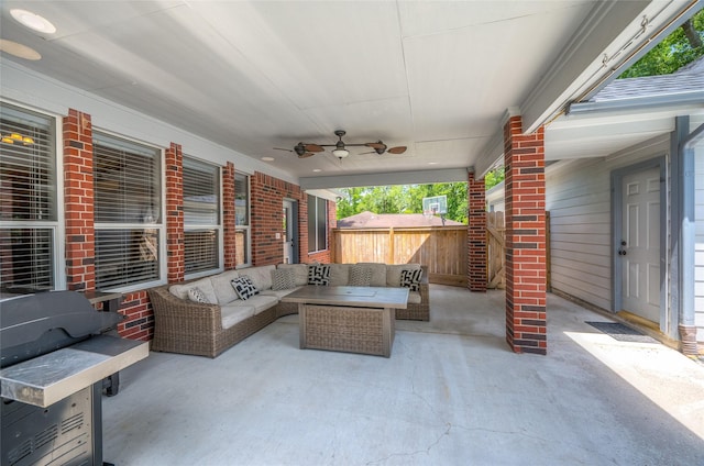view of patio with fence, ceiling fan, and outdoor lounge area