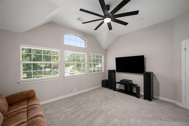 living room with visible vents, carpet flooring, ceiling fan, and lofted ceiling