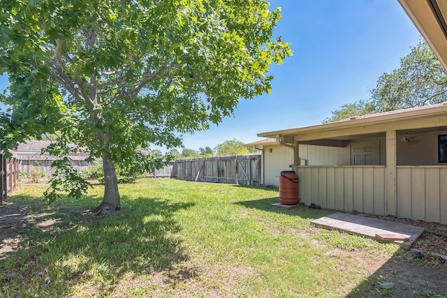 view of yard with a fenced backyard