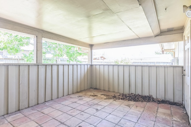 view of patio featuring fence and visible vents