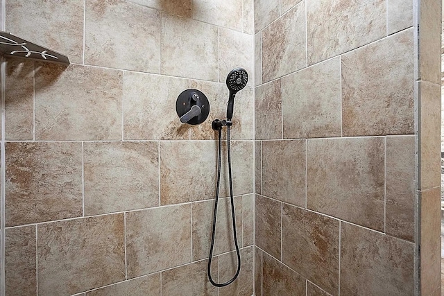 room details with a tile shower