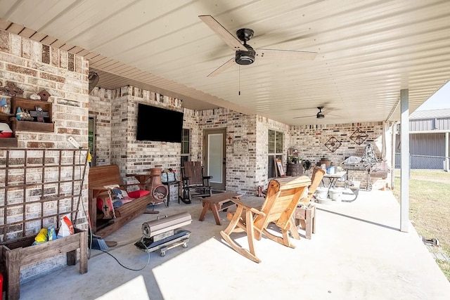 view of patio featuring ceiling fan