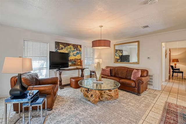 1265 Du Barry Ln, Houston, TX 77018 - tiled living room featuring a textured ceiling, crown molding, and visible vents
