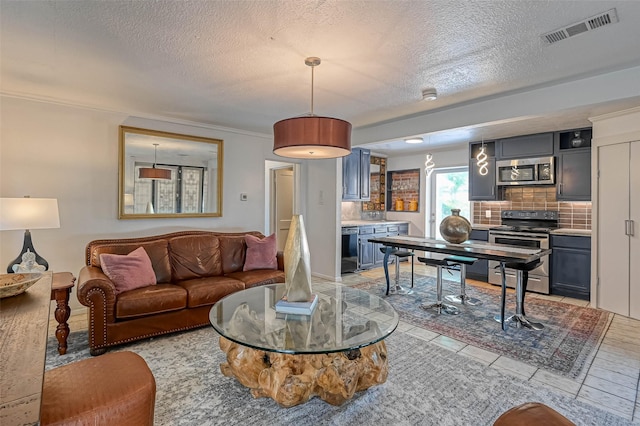 1265 Du Barry Ln, Houston, TX 77018 - living area featuring visible vents and a textured ceiling