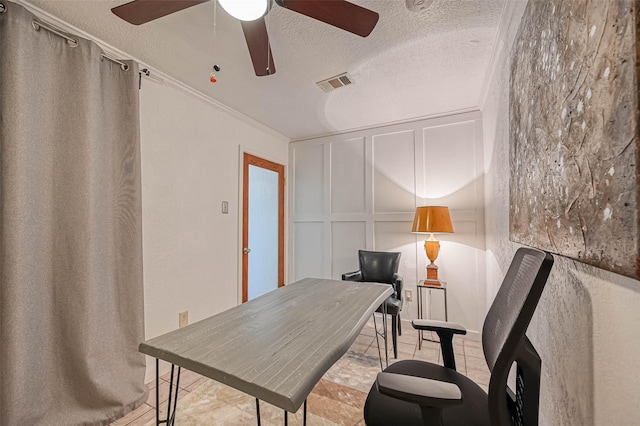1265 Du Barry Ln, Houston, TX 77018 - office area featuring crown molding, a decorative wall, ceiling fan, a textured ceiling, and visible vents