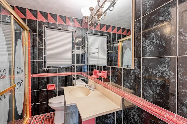 1265 Du Barry Ln, Houston, TX 77018 - bathroom featuring toilet, tile walls, a sink, and a stall shower