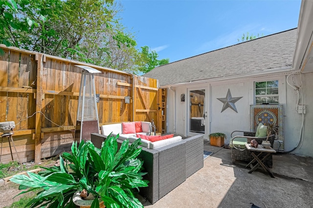 1265 Du Barry Ln, Houston, TX 77018 - view of patio featuring an outdoor living space, fence, and a gate