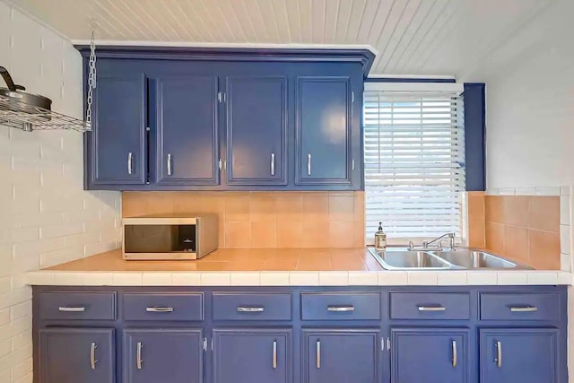 1265 Du Barry Ln, Houston, TX 77018 - bar with decorative backsplash, wooden ceiling, stainless steel microwave, and a sink