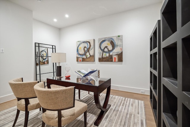 home office featuring recessed lighting, light wood finished floors, and baseboards