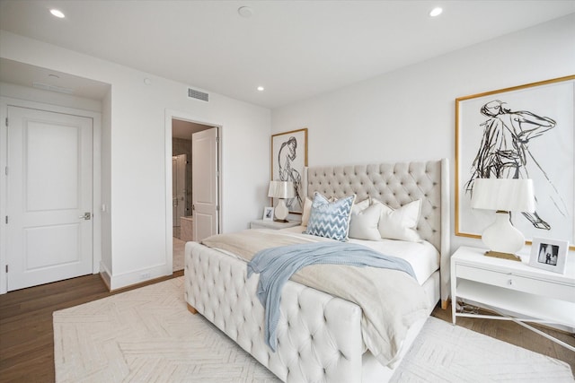 bedroom with recessed lighting, wood finished floors, visible vents, and baseboards